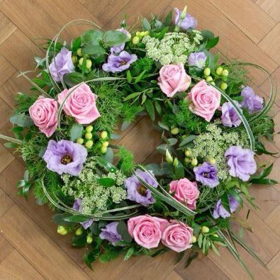 Pink and Lilac Funeral Wreath Blooms of Basingstoke Florists